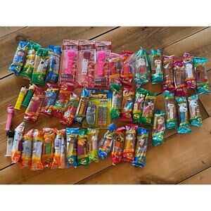 45 Vintage Pez candy dispensers. Holiday. Flinstones. Charlie Brown. Sealed